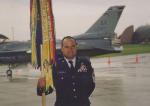 chief holdridge with squadron flag